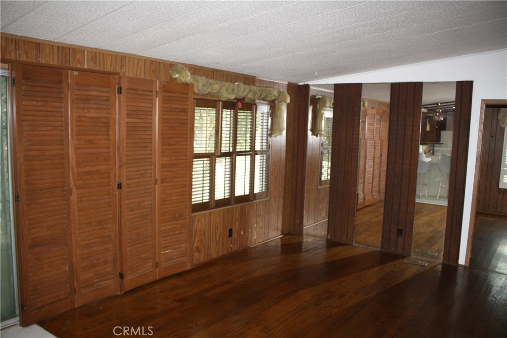 17700 South Avalon, Unit 411 Carson, CA 90746 - Photo 24 of 39 a view of wooden floor and windows in a room