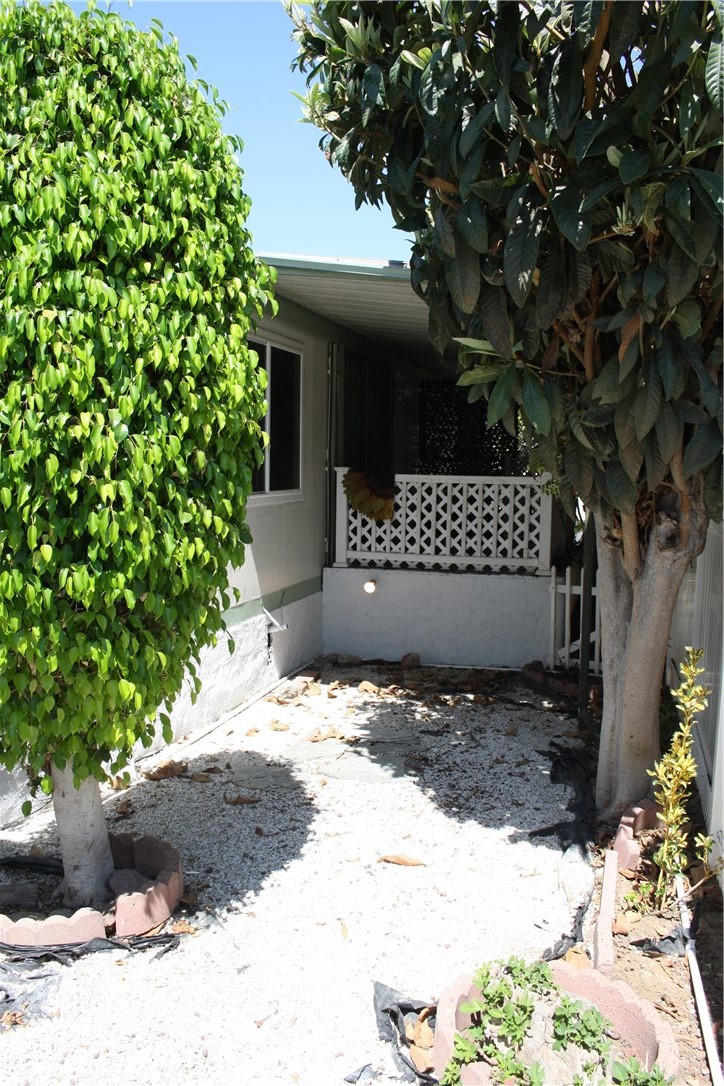 17700 South Avalon, Unit 411 Carson, CA 90746 - Photo 38 of 39 a view of a yard covered with snow in front of house