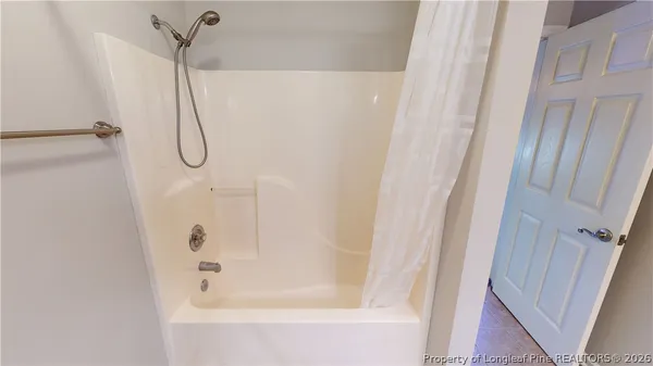 a bathroom with a bathtub