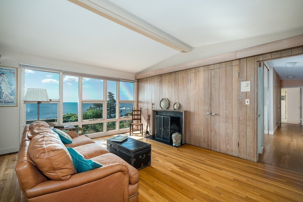 9 Eaglehead Road Manchester, MA 01944 - Photo 13 of 42 a living room with furniture and a fireplace