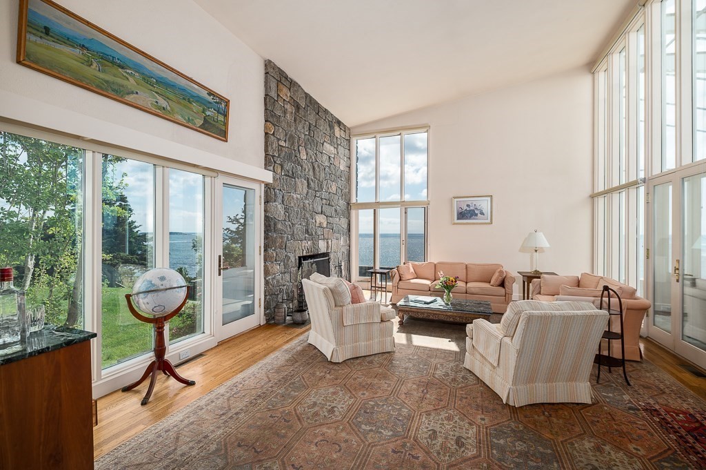 9 Eaglehead Road Manchester, MA 01944 - Photo 9 of 42 a living room with furniture and a floor to ceiling window