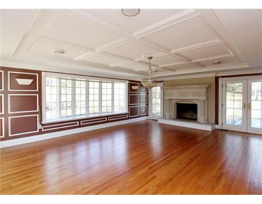423 Stanwich Road Greenwich, CT 06830 - Photo 3 of 9 a view of empty room with wooden floor and fireplace