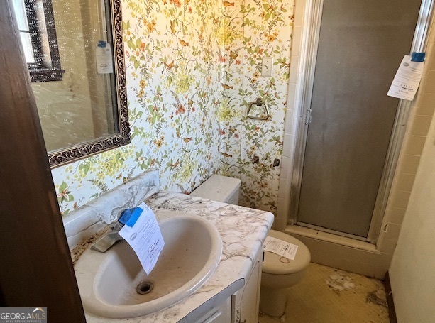 563 Keith Road Guyton, GA 31312 - Photo 8 of 13 a bathroom with a sink and a toilet