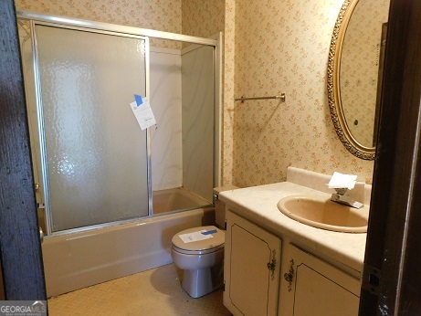 563 Keith Road Guyton, GA 31312 - Photo 10 of 13 a bathroom with a sink toilet and shower