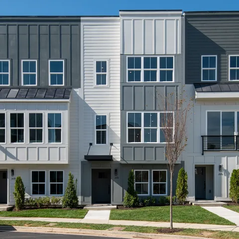 a front view of a building with a street