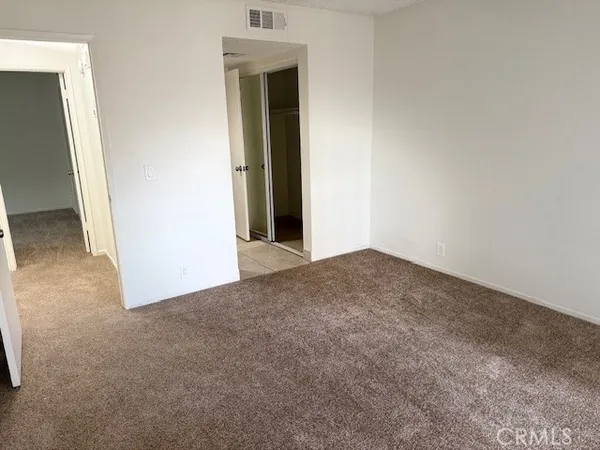 an empty room with closet