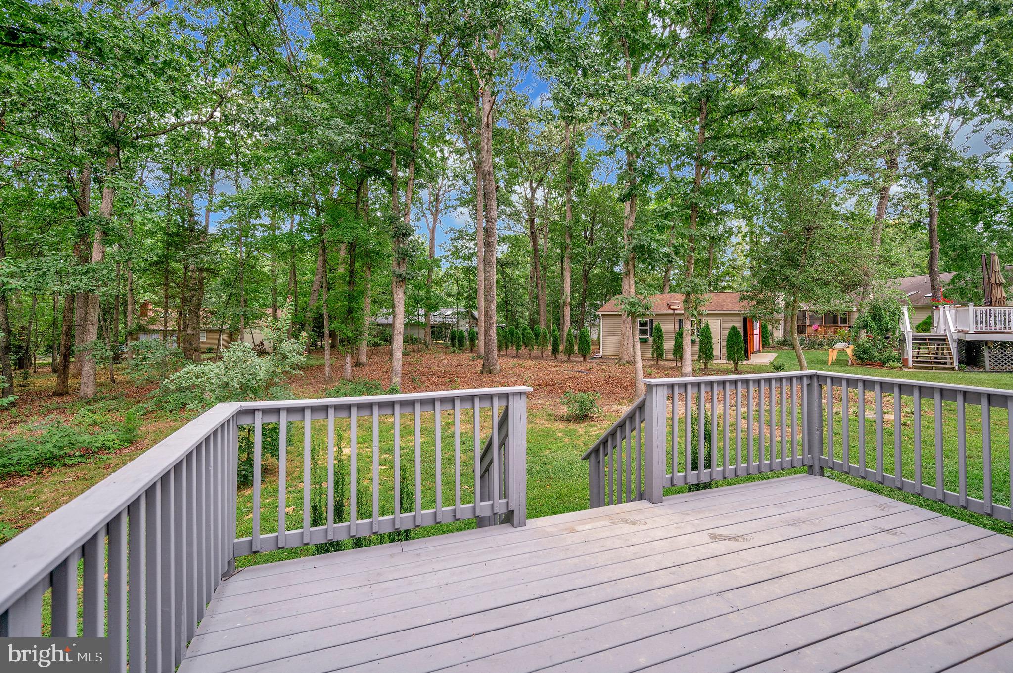 502 Monticello Circle Locust Grove, VA 22508 - Photo 14 of 45 a view of deck with wooden floor and fence