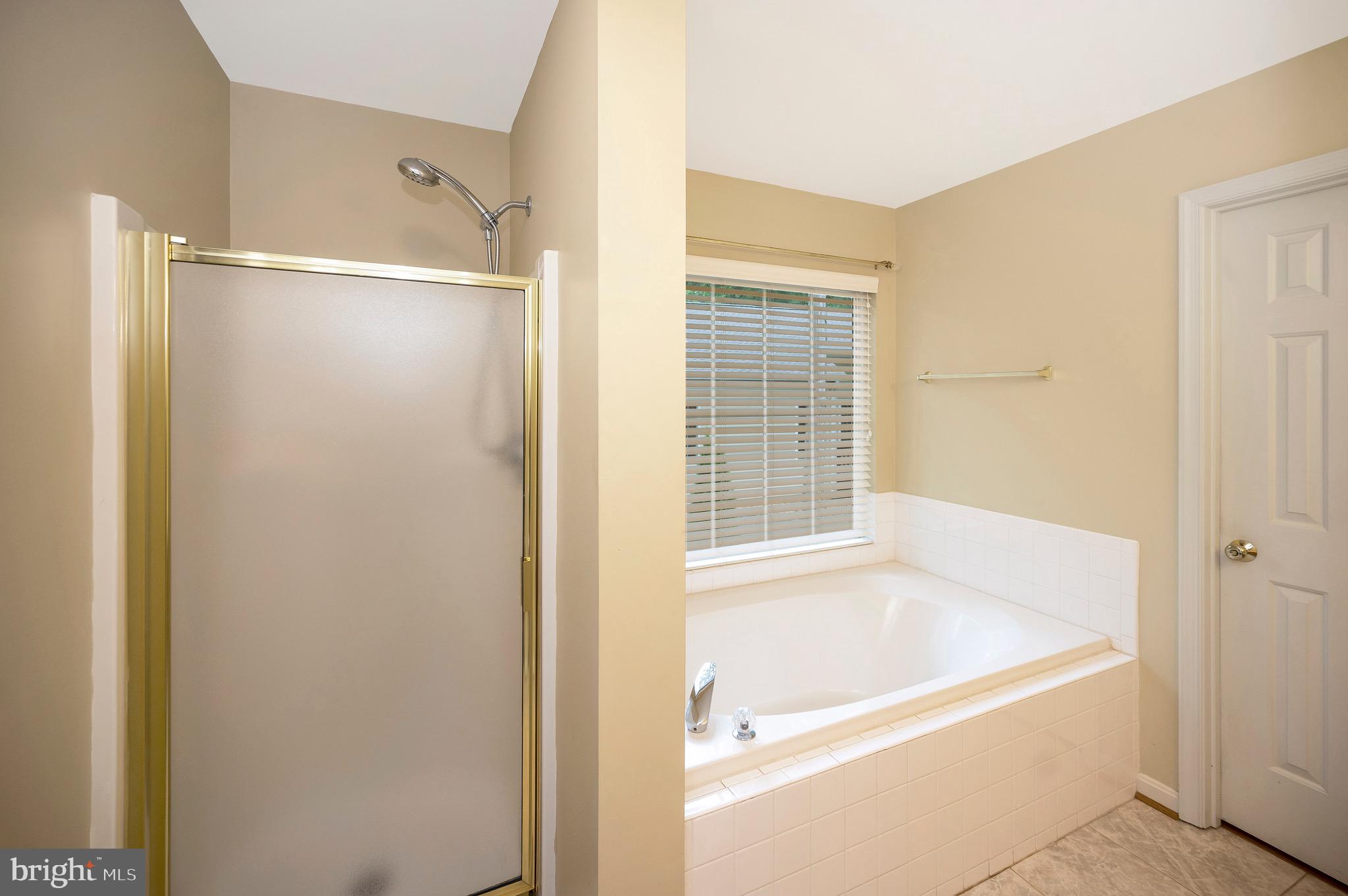502 Monticello Circle Locust Grove, VA 22508 - Photo 20 of 45 a bathroom with a tub and shower