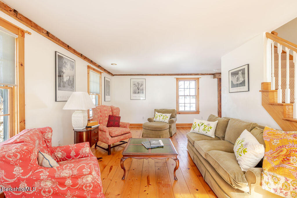 54 Egremont Plain Road Great Barrington, MA 01230 - Photo 15 of 48 a living room with furniture and a large window