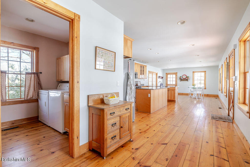 54 Egremont Plain Road Great Barrington, MA 01230 - Photo 17 of 48 a view of a kitchen with furniture and wooden floor