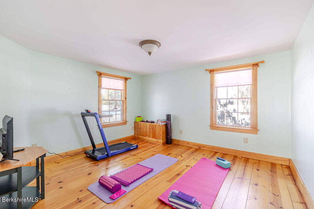 54 Egremont Plain Road Great Barrington, MA 01230 - Photo 19 of 48 a bedroom with a bed and a window
