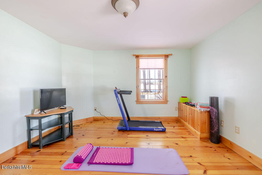 54 Egremont Plain Road Great Barrington, MA 01230 - Photo 20 of 48 a view of a room with gym equipment
