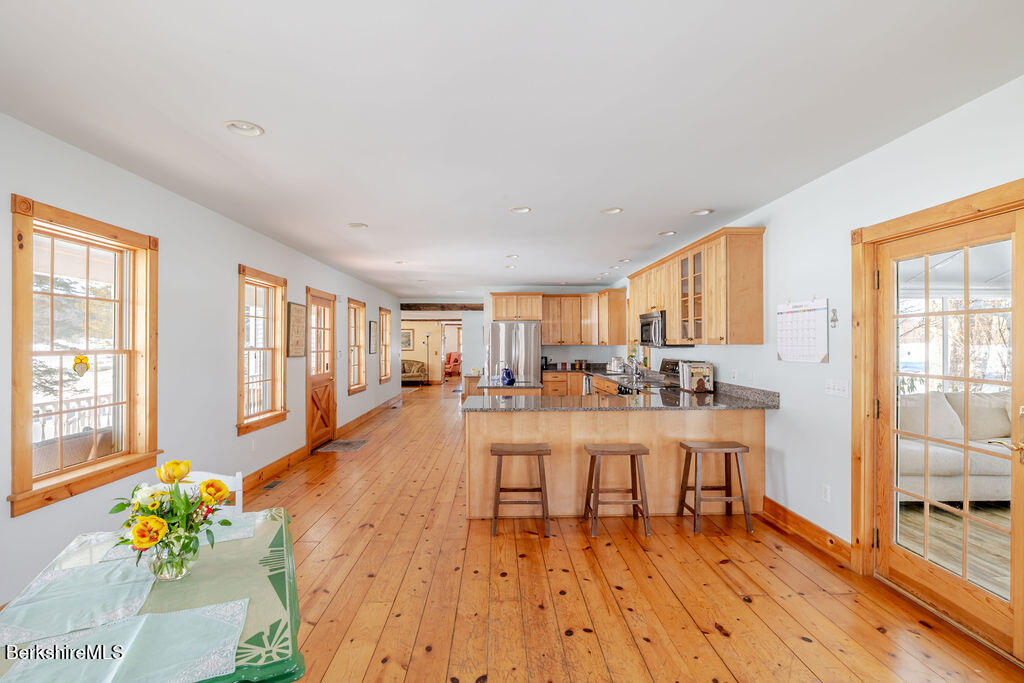 54 Egremont Plain Road Great Barrington, MA 01230 - Photo 2 of 48 a living room with furniture and wooden floor