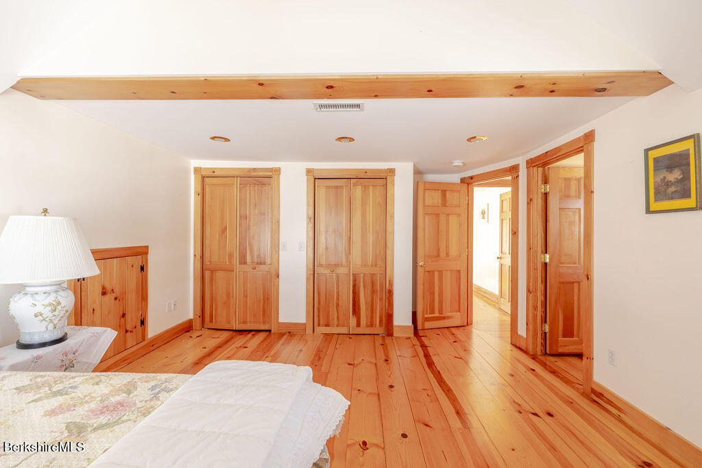 54 Egremont Plain Road Great Barrington, MA 01230 - Photo 23 of 48 a bedroom with a bed and a window