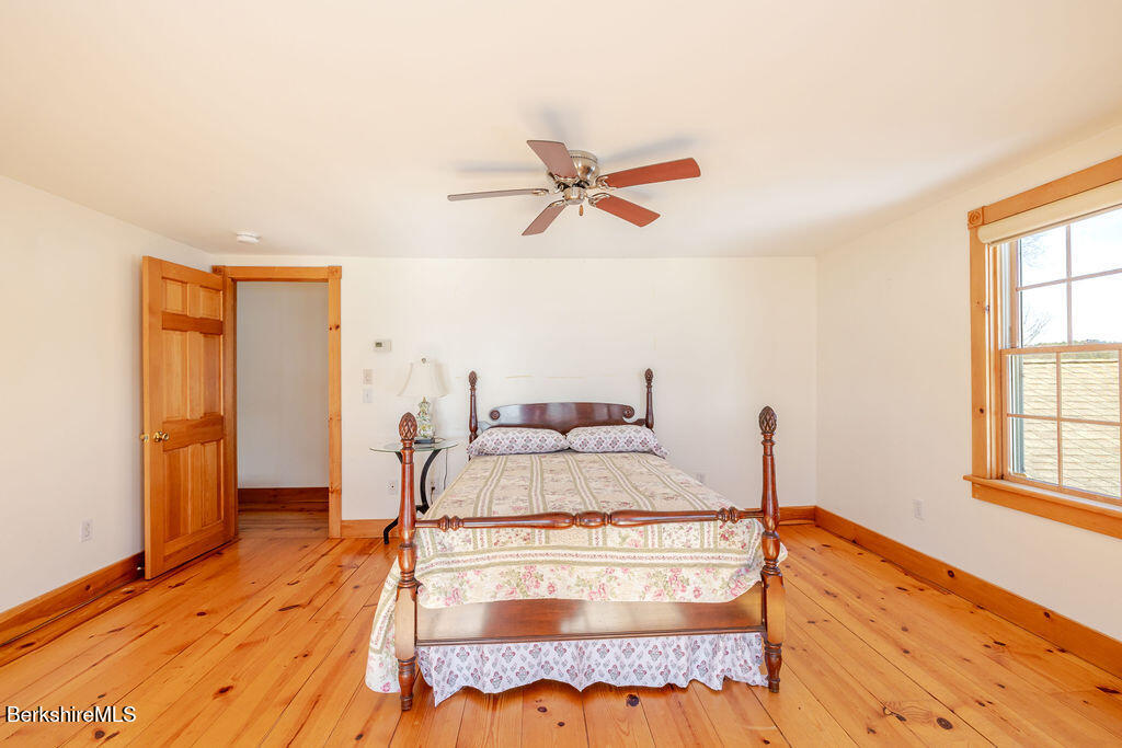 54 Egremont Plain Road Great Barrington, MA 01230 - Photo 30 of 48 a bed room with a bed