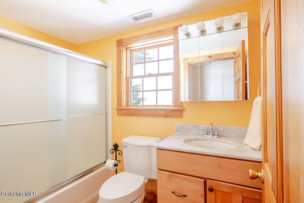 54 Egremont Plain Road Great Barrington, MA 01230 - Photo 35 of 48 a bathroom with a sink toilet and shower