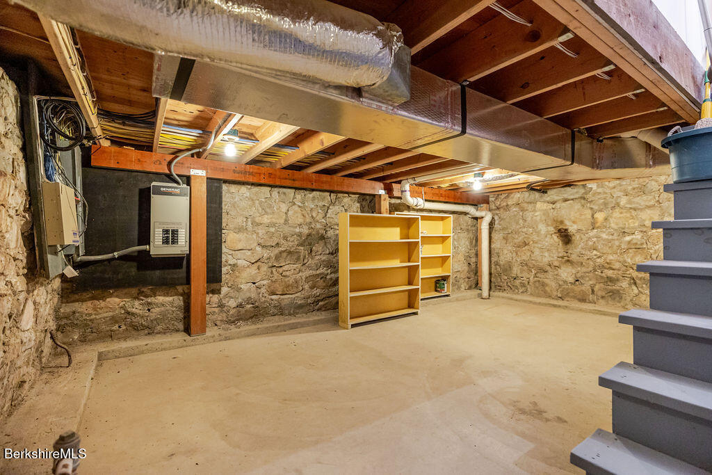 54 Egremont Plain Road Great Barrington, MA 01230 - Photo 36 of 48 a view of an empty room with wooden walls