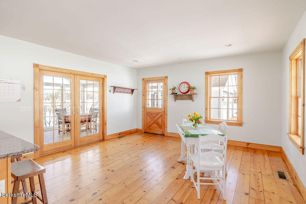 54 Egremont Plain Road Great Barrington, MA 01230 - Photo 7 of 48 a living room with furniture and wooden floor