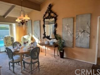 32592 Balearic Dana Point, CA 92629 - Photo 15 of 26 a dining room with furniture and chandelier