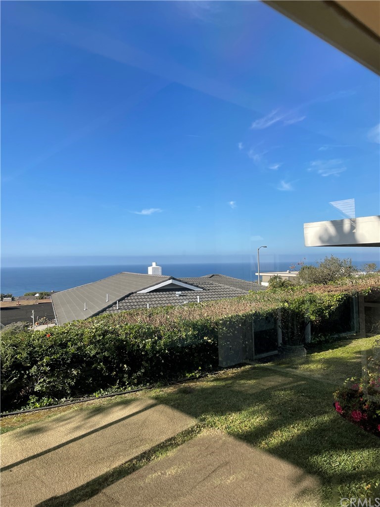 32592 Balearic Dana Point, CA 92629 - Photo 6 of 26 a view of a swimming pool with an outdoor space and seating area