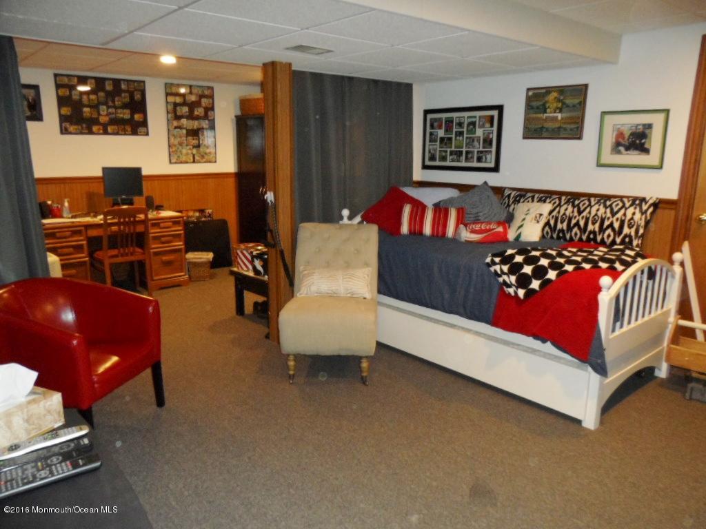 105 Lancaster Road Freehold, NJ 07728 - Photo 15 of 20 Finished Basement