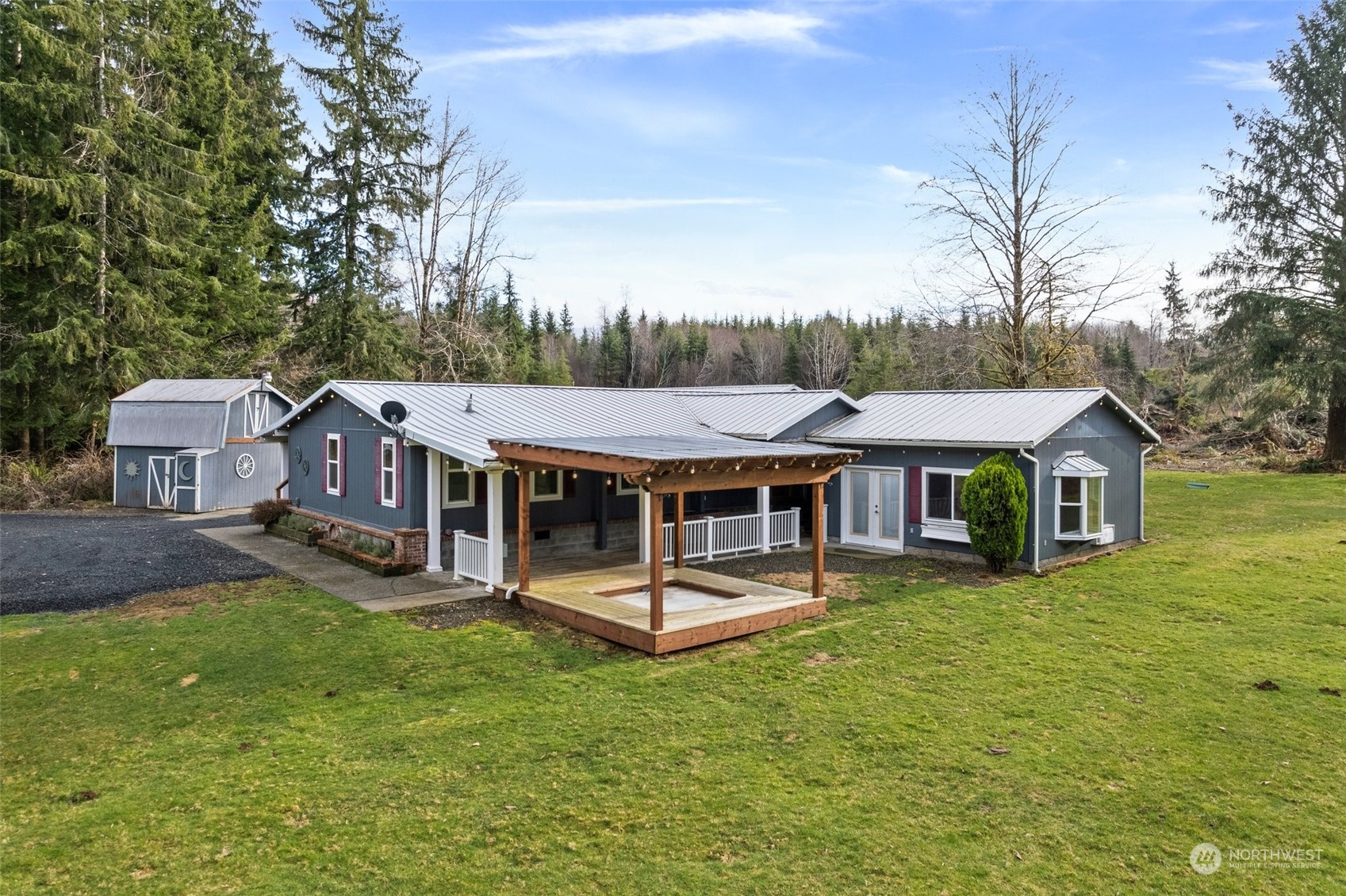 a view of a house with pool table and chairs