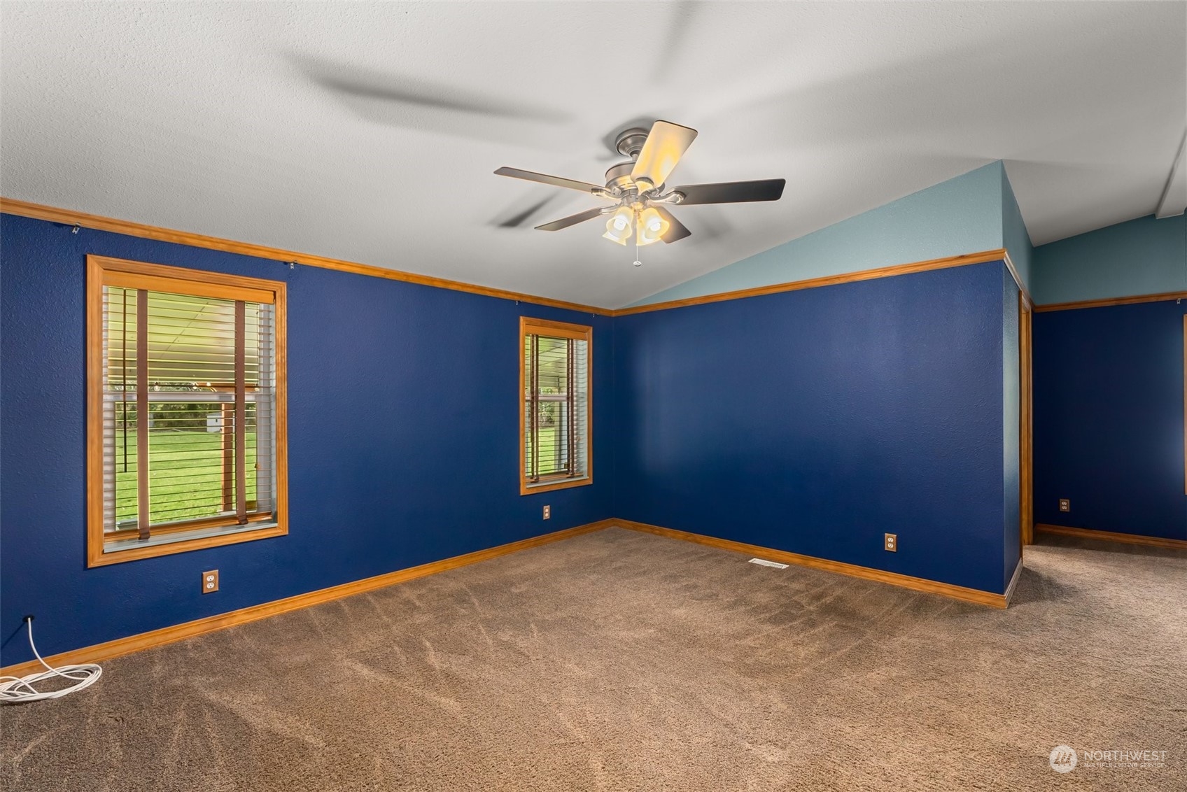 47 Zowadski Road Raymond, WA 98577 - Photo 19 of 40 a view of a room with a ceiling fan and a window