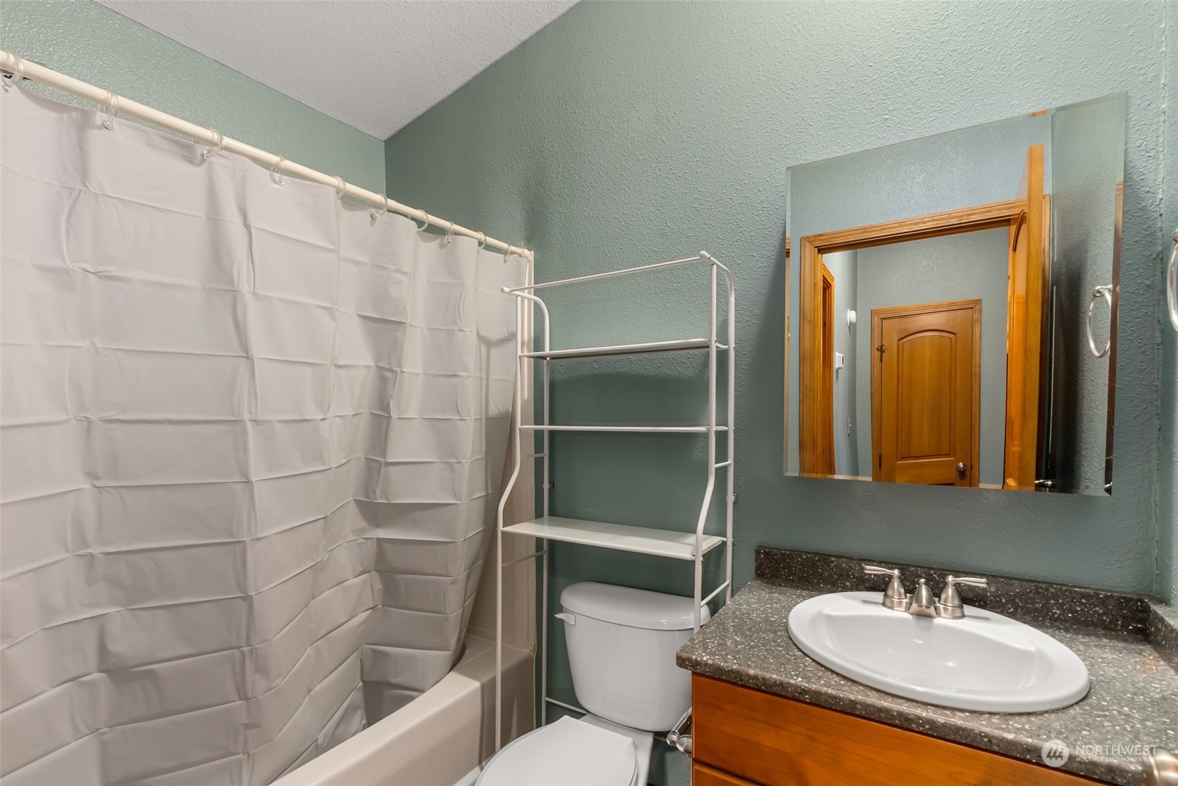 47 Zowadski Road Raymond, WA 98577 - Photo 25 of 40 a bathroom with a sink a toilet and shower