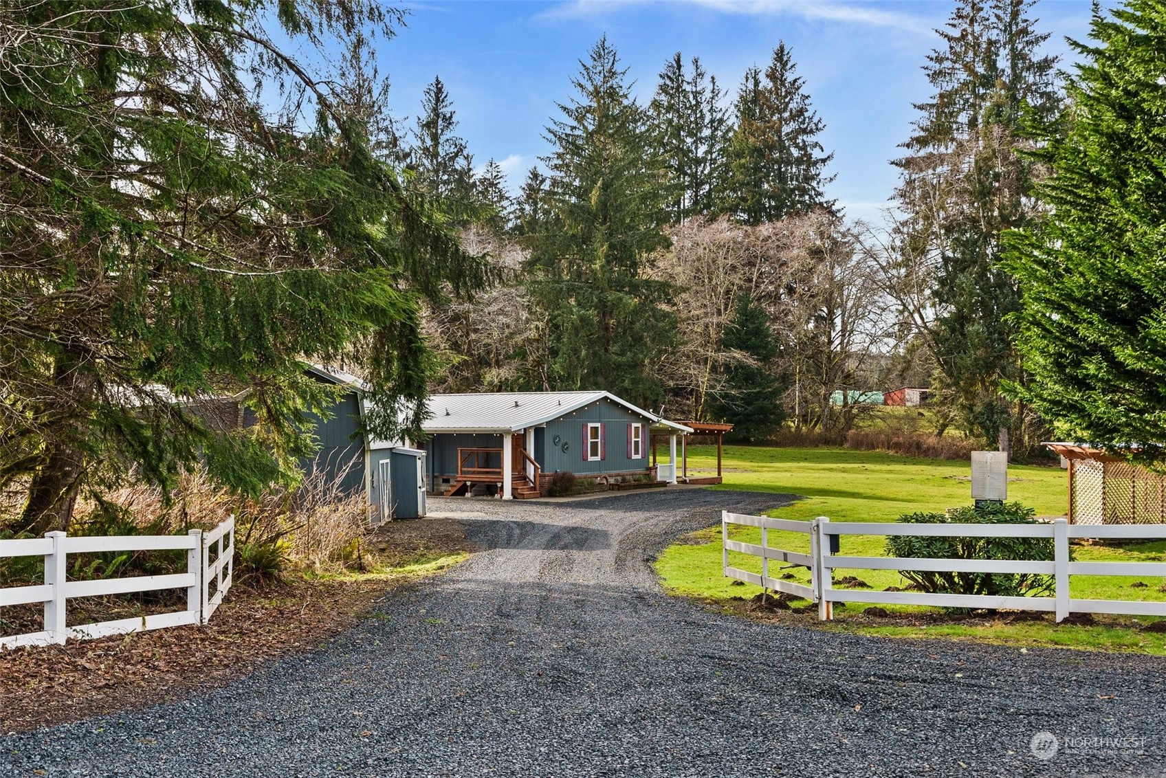 47 Zowadski Road Raymond, WA 98577 - Photo 3 of 40 a view of a house with a yard and sitting area