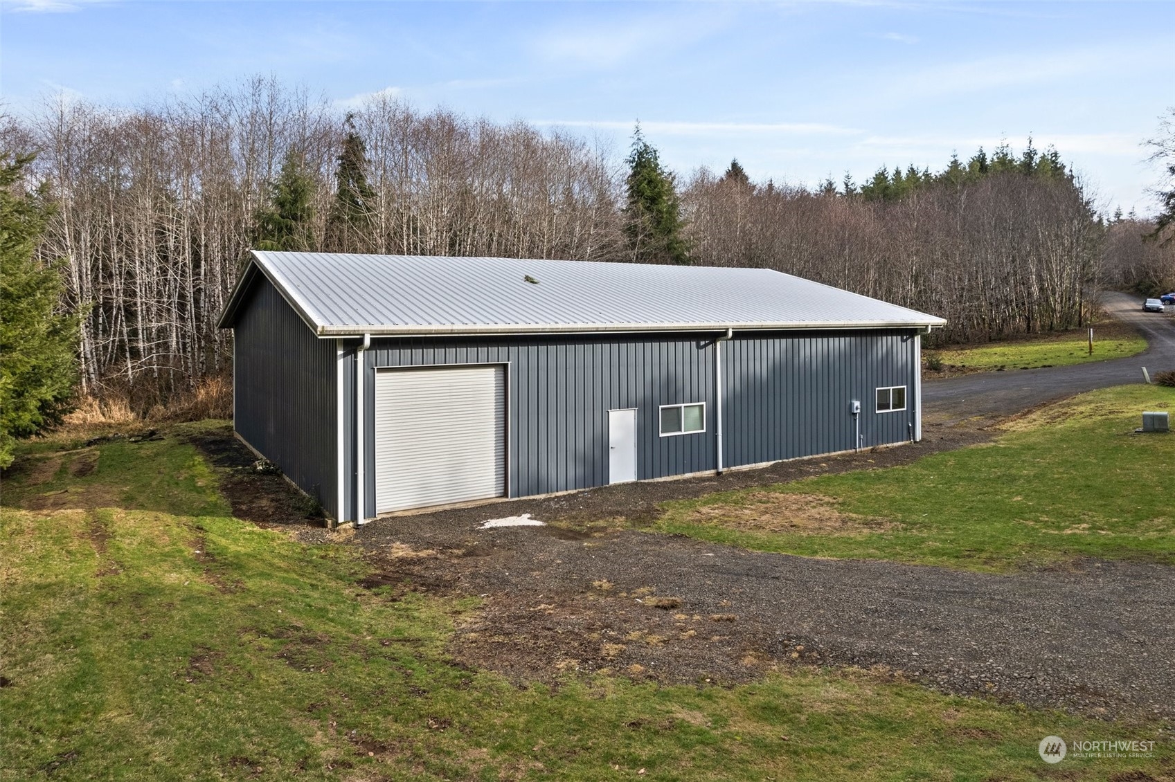 47 Zowadski Road Raymond, WA 98577 - Photo 36 of 40 a house with trees in the background
