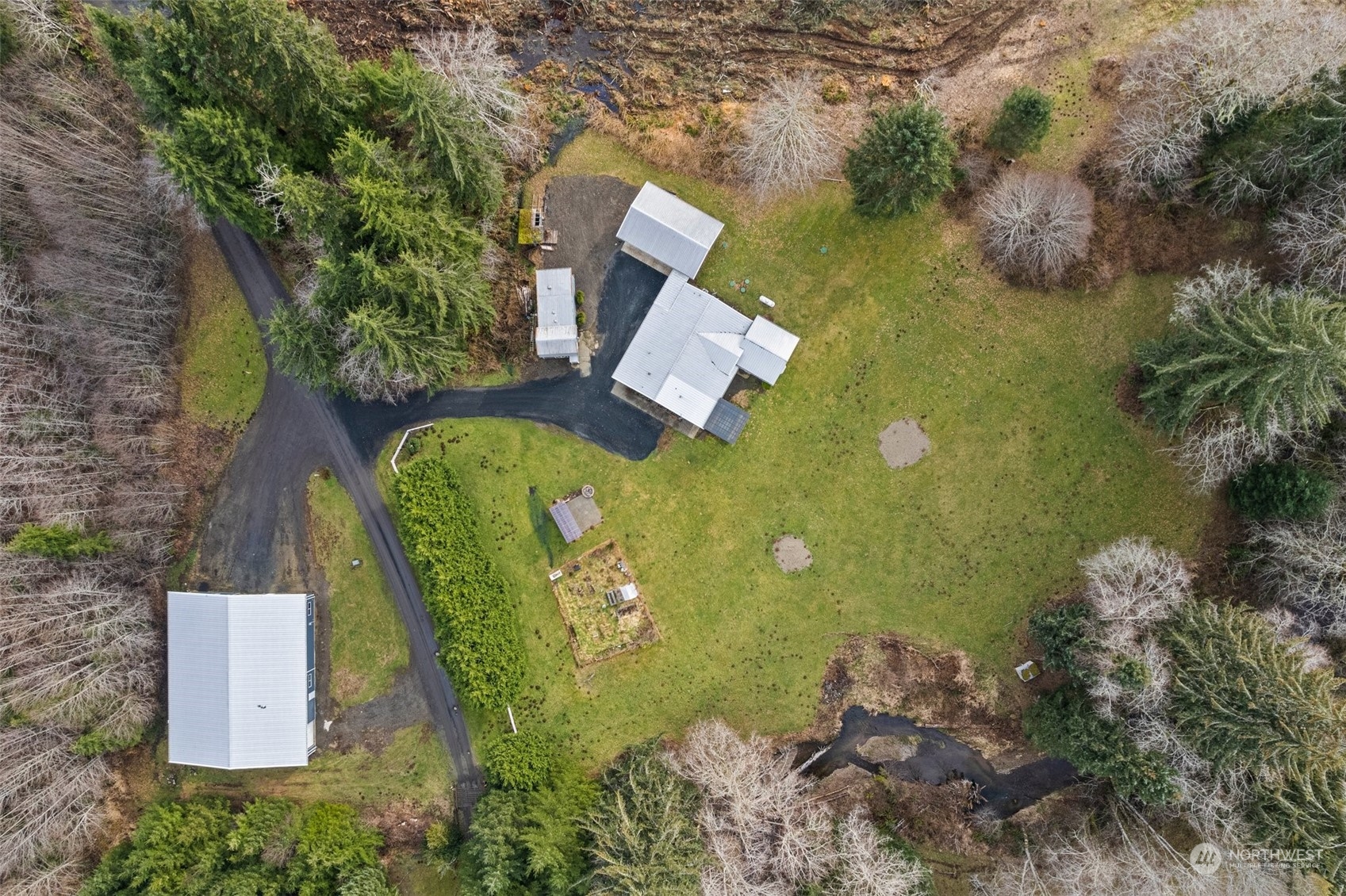 47 Zowadski Road Raymond, WA 98577 - Photo 7 of 40 an aerial view of a house with swimming pool and outdoor space