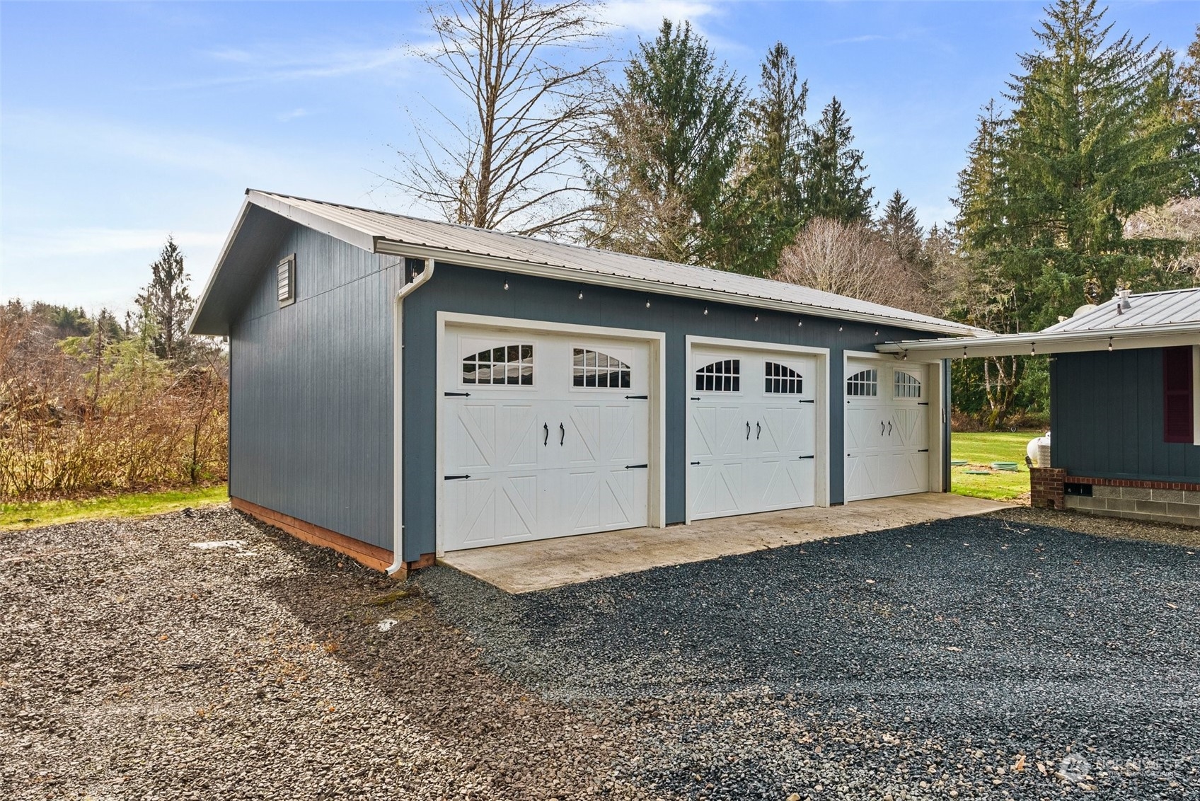 47 Zowadski Road Raymond, WA 98577 - Photo 9 of 40 a view of a house with a large tree and a big yard