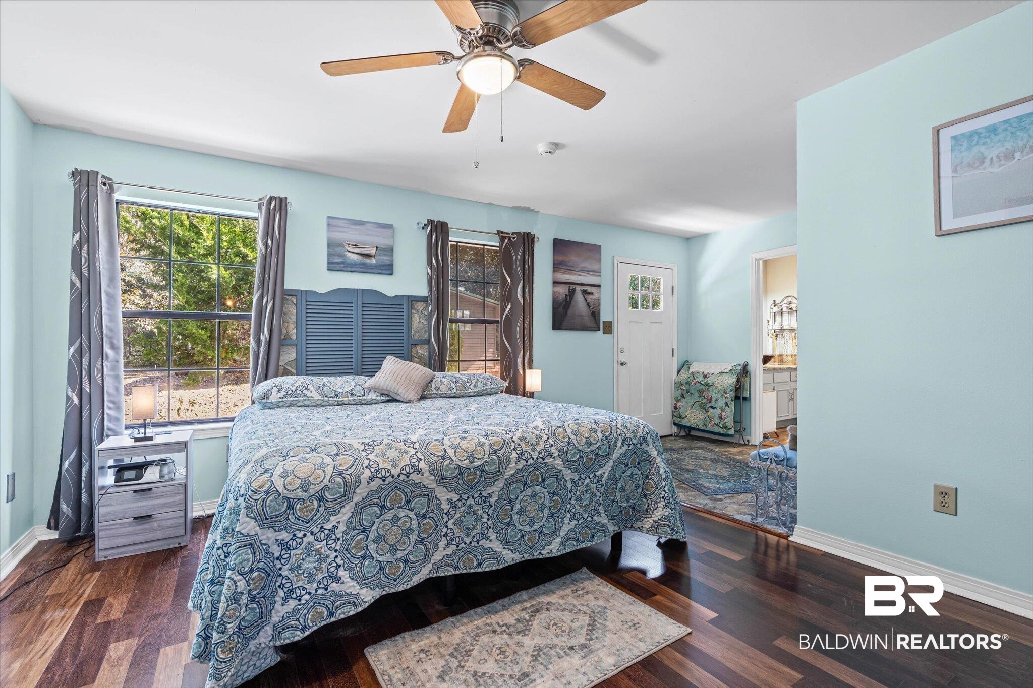 3846 Leslie Road Saraland, AL 36571 - Photo 14 of 40 Bedroom featuring dark wood-type flooring, a ceiling fan, and ensuite bathroom