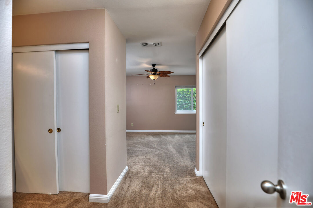 3415 Circle View Drive Simi Valley, CA 93063 - Photo 17 of 37 a view of a hallway with closet and window