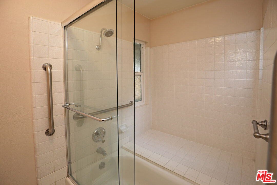 3415 Circle View Drive Simi Valley, CA 93063 - Photo 25 of 37 a bathroom with a shower and a glass door
