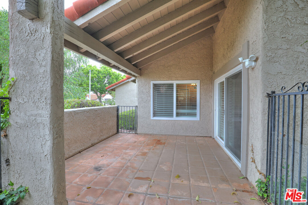 3415 Circle View Drive Simi Valley, CA 93063 - Photo 36 of 37 a view of a porch with wooden floor and fence