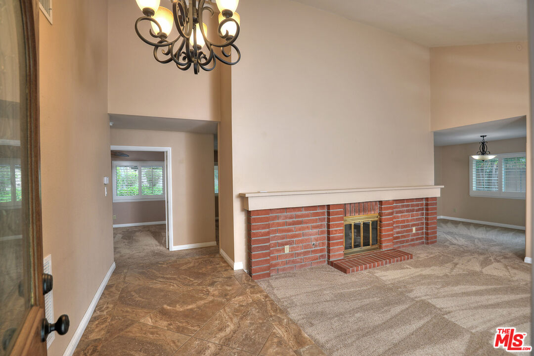 3415 Circle View Drive Simi Valley, CA 93063 - Photo 4 of 37 a view of empty room with window and fireplace