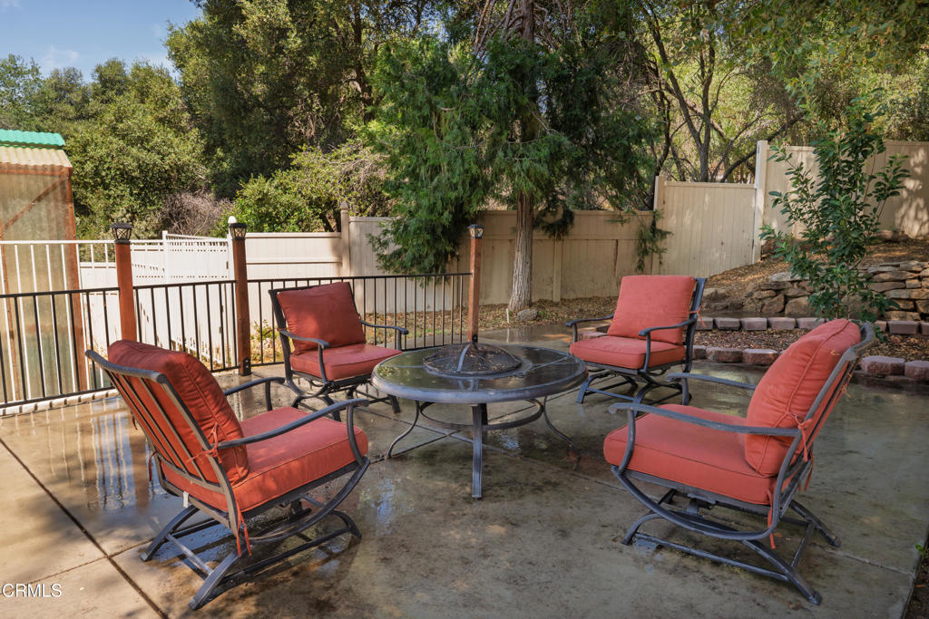 51793 Quail Ridge Road Oakhurst, CA 93644 - Photo 58 of 70 a building outdoor space with patio furniture