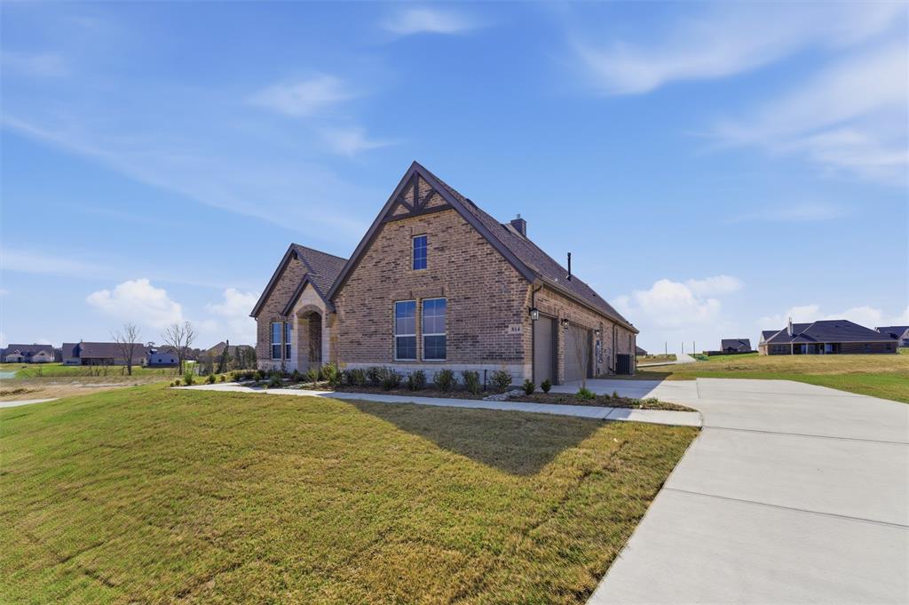 814 Vly Rdg Road Van Alstyne, TX 75495 - Photo 3 of 24 a view of an house with swimming pool and mountains