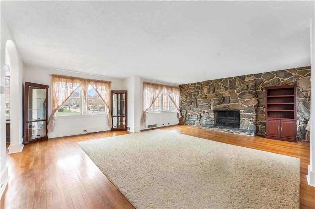 201 4th Street Beaver, PA 15009 - Photo 11 of 50 an empty room with windows and fireplace