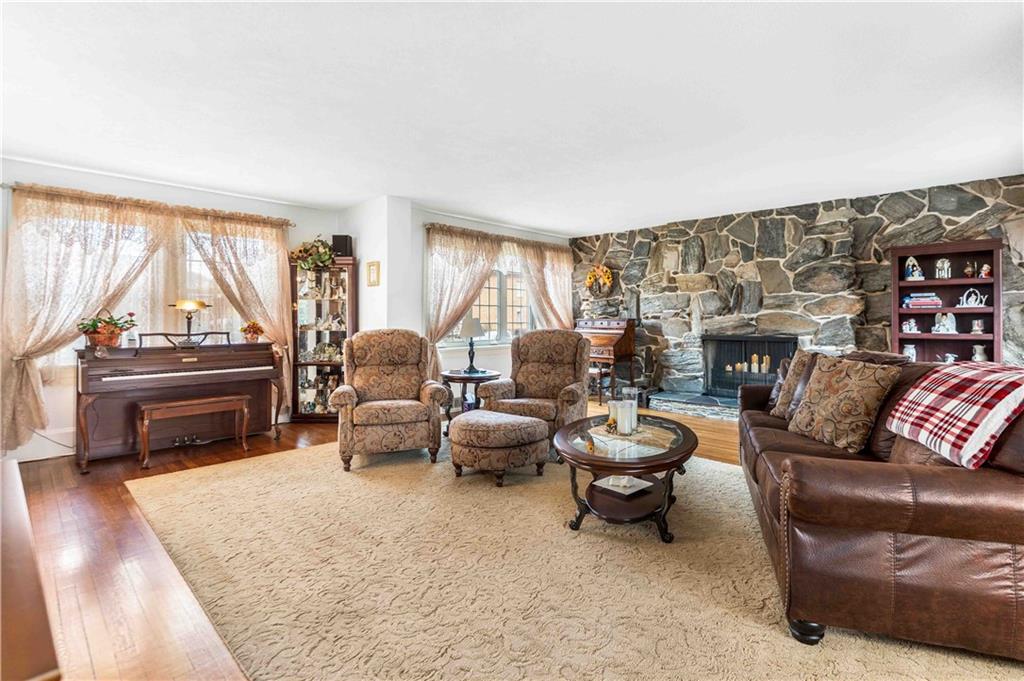 201 4th Street Beaver, PA 15009 - Photo 11 of 42 a living room with furniture and a fireplace