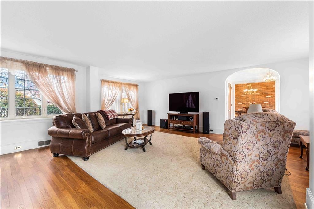 201 4th Street Beaver, PA 15009 - Photo 12 of 42 a living room with furniture and a flat screen tv
