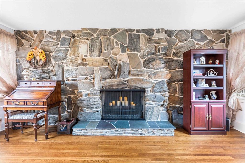 201 4th Street Beaver, PA 15009 - Photo 12 of 50 a living room with hard wood floors and a fireplace