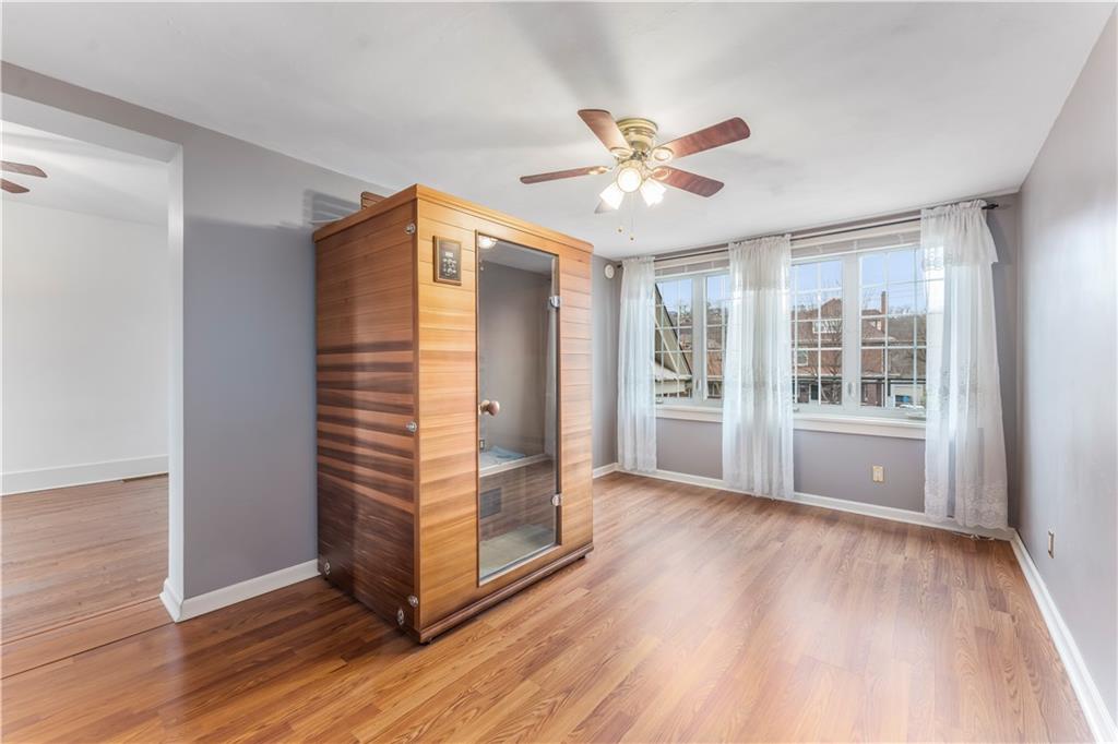 201 4th Street Beaver, PA 15009 - Photo 29 of 50 a view of an empty room with wooden floor and a window