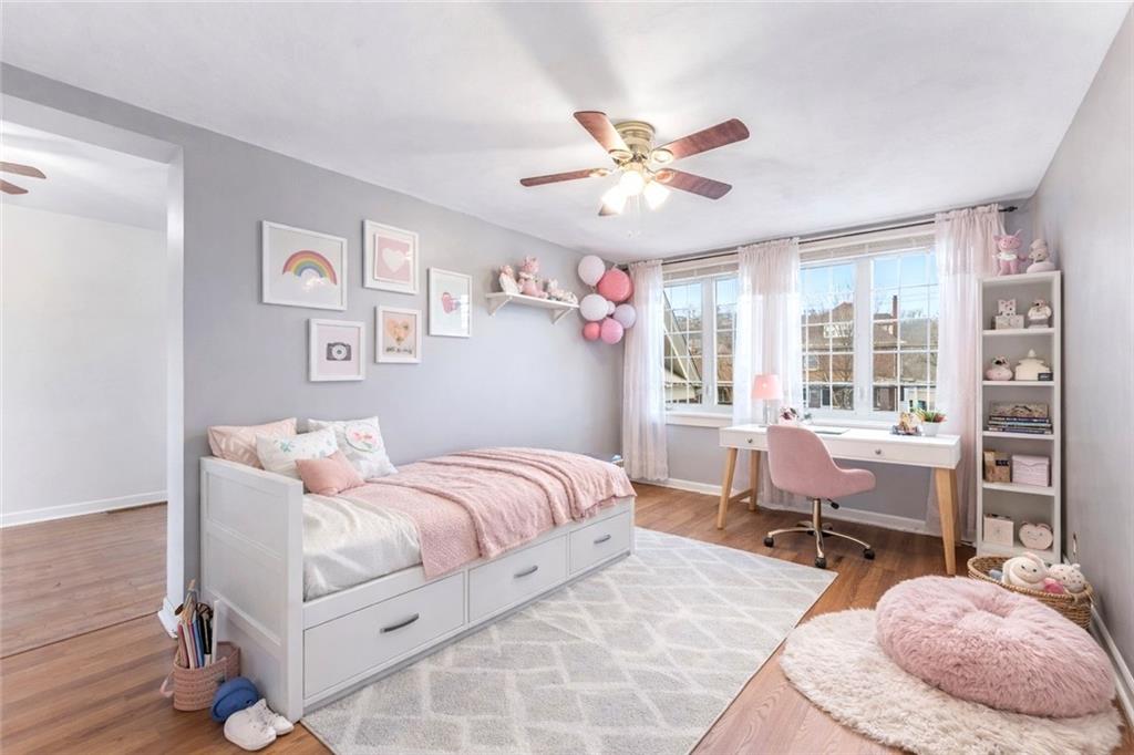 201 4th Street Beaver, PA 15009 - Photo 30 of 50 a bedroom with a bed and a chandelier