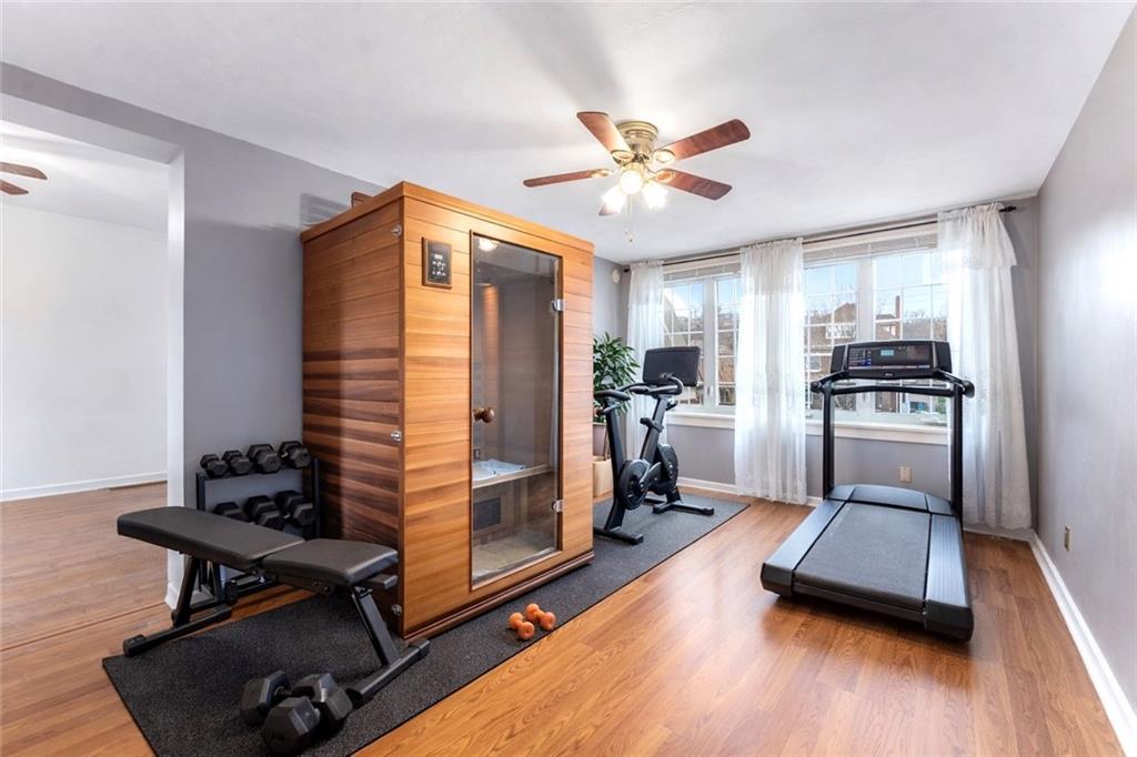 201 4th Street Beaver, PA 15009 - Photo 32 of 50 a kitchen with a refrigerator a stove top oven a sink and wooden floor