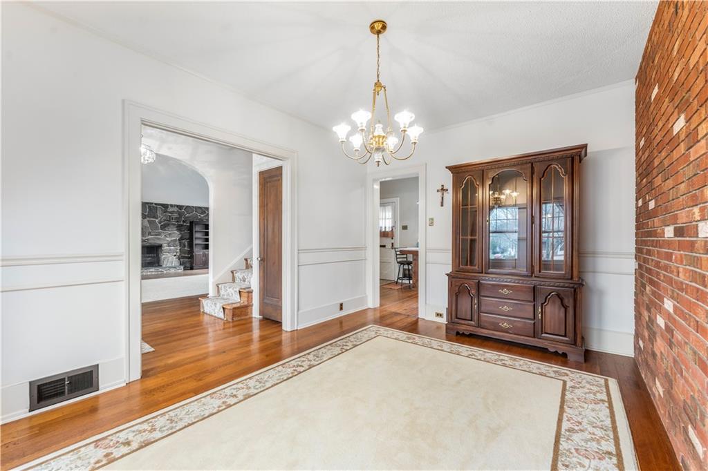 201 4th Street Beaver, PA 15009 - Photo 5 of 50 a view of a livingroom with wooden floor and a ceiling fan