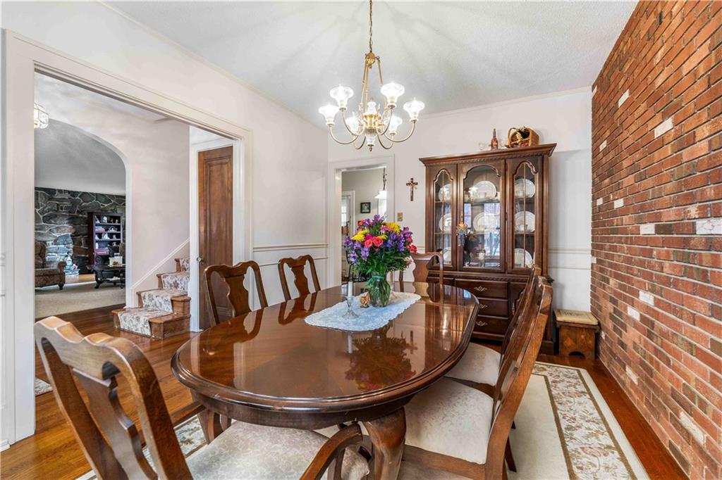 201 4th Street Beaver, PA 15009 - Photo 5 of 42 a view of a dining room with furniture and a chandelier
