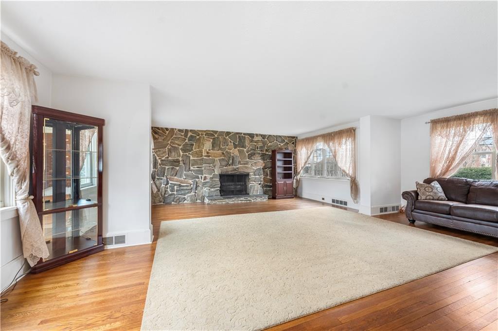 201 4th Street Beaver, PA 15009 - Photo 10 of 50 a bedroom with a bed and a couch with window