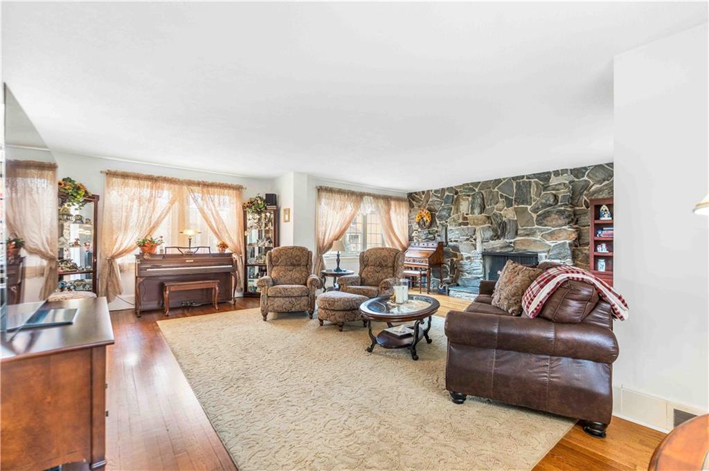 201 4th Street Beaver, PA 15009 - Photo 10 of 42 a living room with furniture and a fireplace